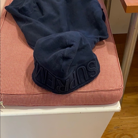Supreme Other - A supreme hoodie with logo on hood